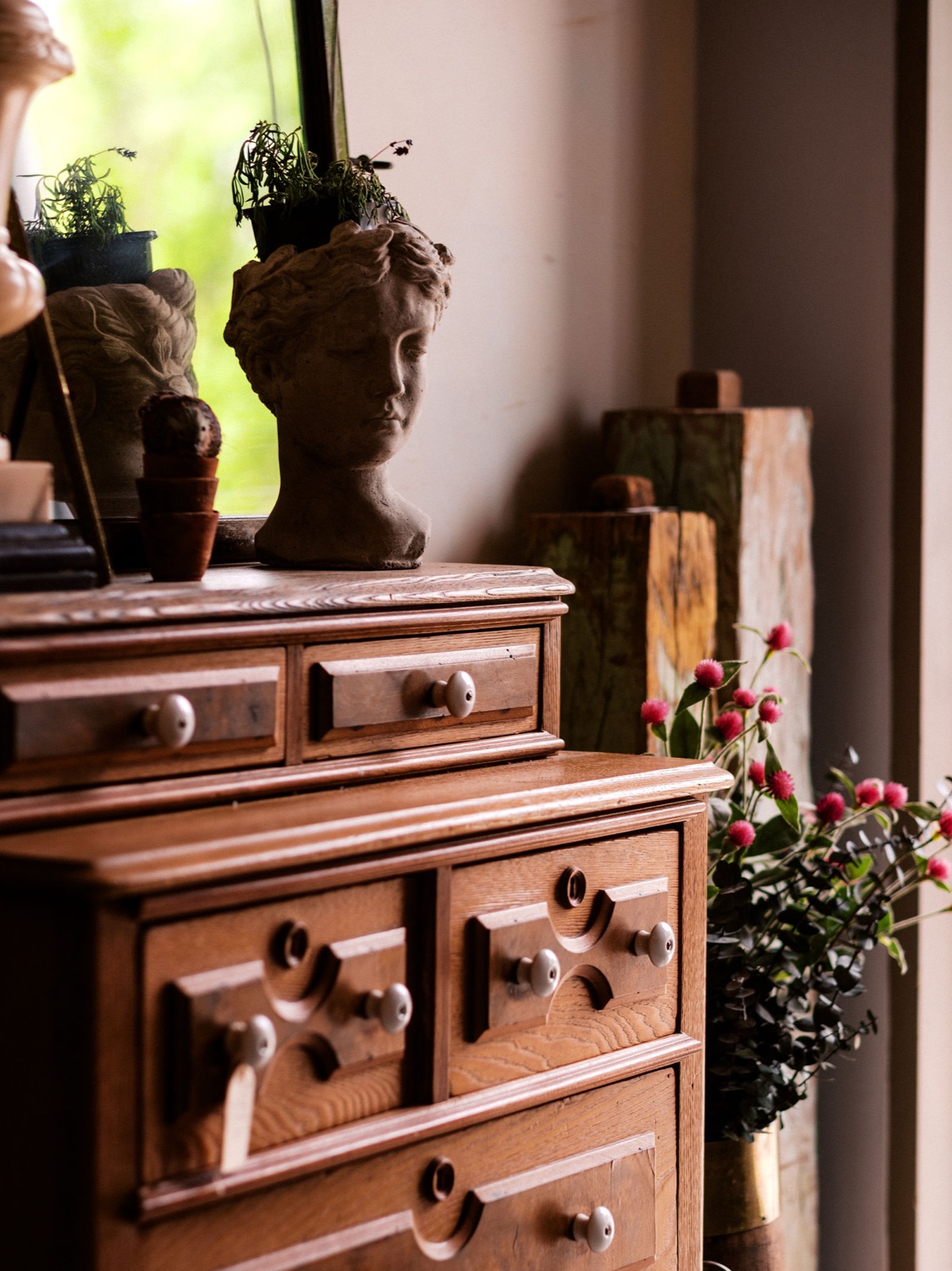 Antique bust and dresser inside the Antique Annex